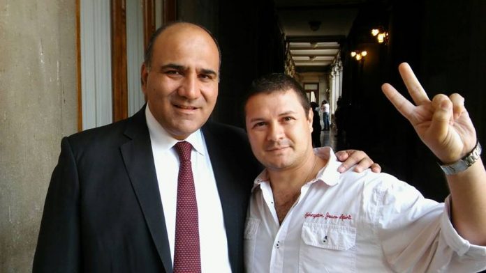 Luis Romano con Manzur