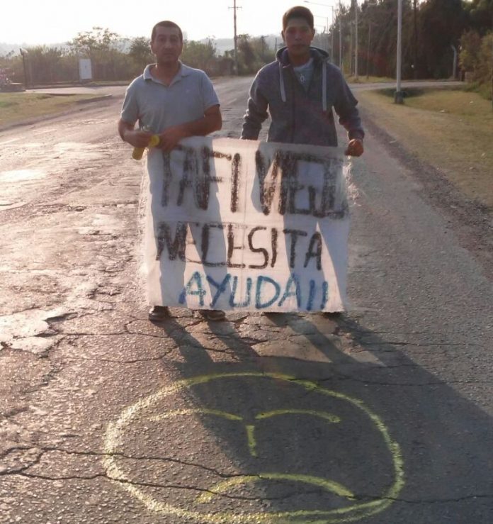 caritas-tristes-sobre-el-pavimento-en-Tafi-Viejo